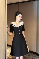 Váy nữ dáng A màu đen cổ bèo 3 lớp đính cúc đá trang trí vải tuyết mưa YAME YV350