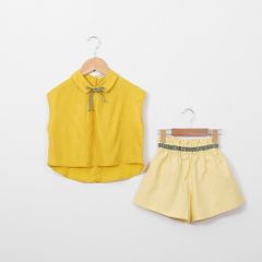 Set Áo Tơ Nơ Caro Kèm Quần Đùi Linen Bé Gái