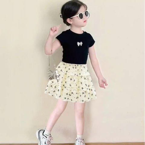Set Váy Áo Thun Gân Đính Nơ Kèm Chân Váy Ren Nơ Bé Gái Nexxi