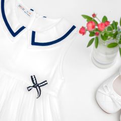 Váy Lụa Dập Ly Cổ Sen Đính Nơ Bé Gái
