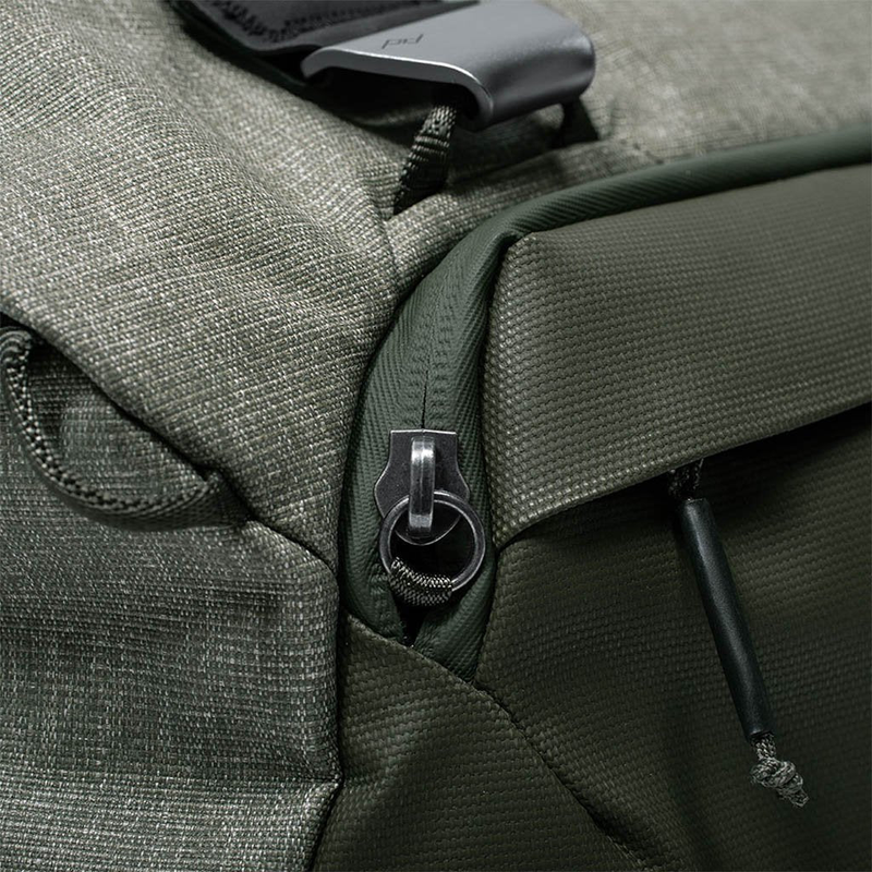 Keep the side pocket zipper pull inside