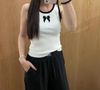  Áo 3 lỗ trắng viền đen - nơ xê quin 