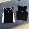  Áo tank top đen tim ngực 