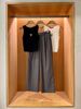 Áo tank top đen tim ngực 