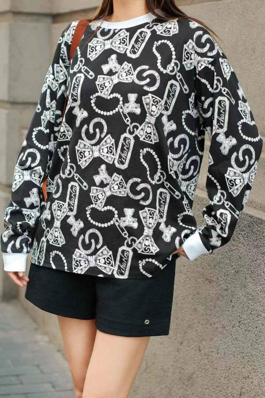  Áo đen dài tay - hoạ tiết nơ 