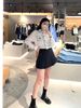  Sơ mi trắng , viền đen. túi ngực CC 