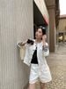  Bộ áo khoác và quần sooc jean trắng set 