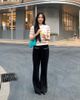  Quần nỉ đen hai túi viền trắng 