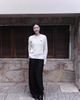  Áo len trắng thừng, gấu đỏ ngực trái 