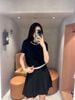  Áo phông đen chữ viền cổ cong CH 