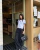  Áo phông trắng - chữ trên gấu dưới 