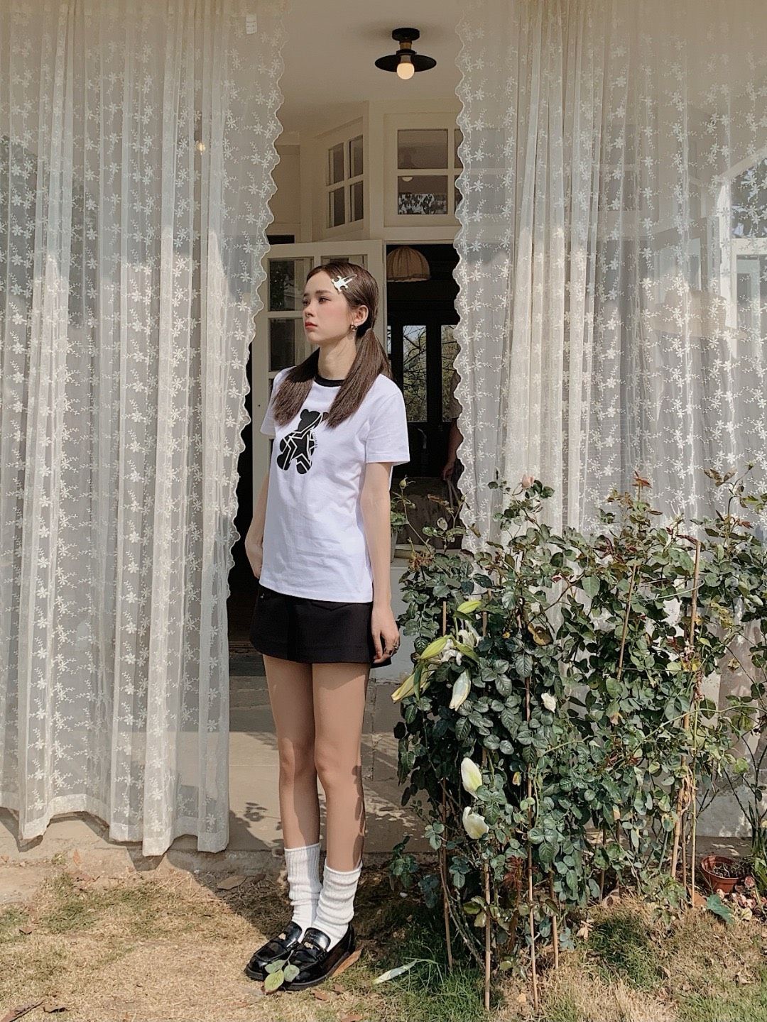  Áo T- shirt trắng gấu đen 