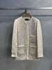  Áo dạ tweed chấm sắc màu 