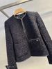  Áo dạ tweed đen. tay nơ 