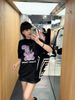  Áo phông đen gấu tím 