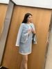  Váy xanh viền trắng, 2 túi 