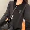  CDG đen logo chữ lồng CC 