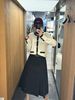  Chân váy midi xếp ly đen kèm belt nhỏ vàng 