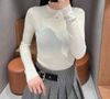  Áo len cổ tròn trắng 4.4 