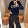  Áo len viền cổ xám chữ CCharles 
