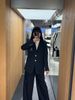  Vest đen 2 cúc chữ lồng CC túi ngực 