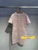  Váy tweed hồng phối cúc ngọc 