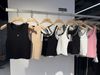  Áo tank top trắng viền đen CC 