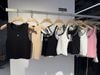  Áo tank top đen viền trắng CC 