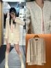  Áo dạ tweed chấm sắc màu 