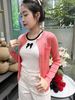  Áo CDG hồng đào - túi ngực chữ trắng 