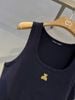  Ba lỗ xanh navy, gấu vàng 