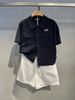  Áo xanh Navy 2 túi ngực cài cúc 