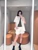  Áo sơmi tay ngắn, phối họa tiết ren túi ngực 