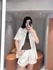  Áo sơmi tay ngắn, phối họa tiết ren túi ngực 