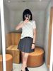  Chân váy ngắn len ghi xám nơ nhỏ 