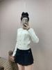  CDG trắng cúc vàng 