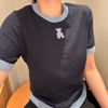  Áo xanh navy - gấu ngọc 