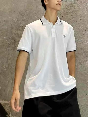  Áo polo trắng, viền đen, chữ Studio ngực trái 
