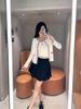  Chân váy ngắn xếp ly Cạp trắng 