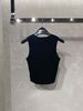  Áo tank top đen tim ngực 