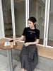  Áo đen len tăm ngắn tay -chữ CC ngực 