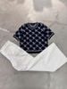  Áo len ngắn tay full logo - xanh navy 