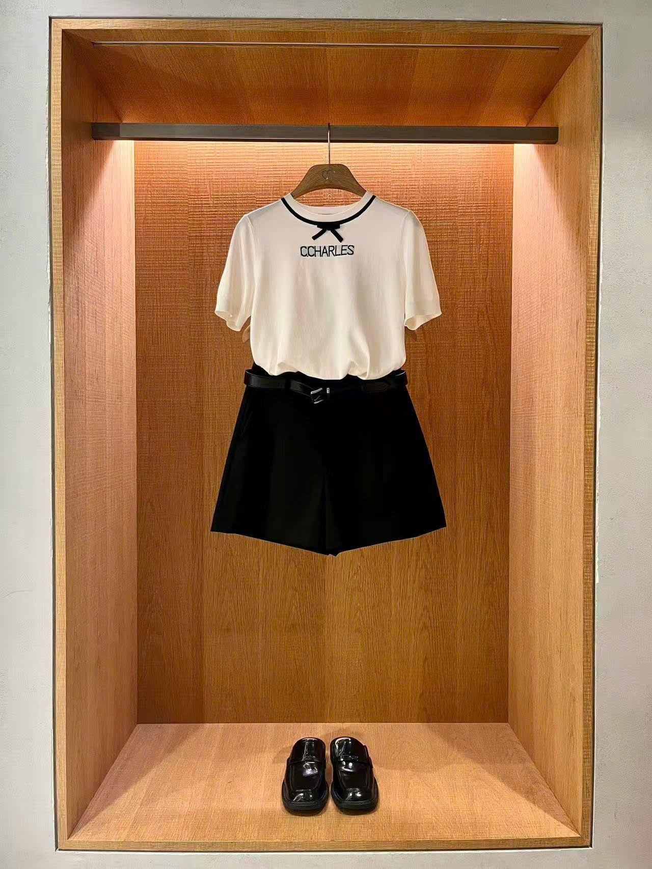  Chân váy chữ A đen, 2 túi trước kèm Belt da 