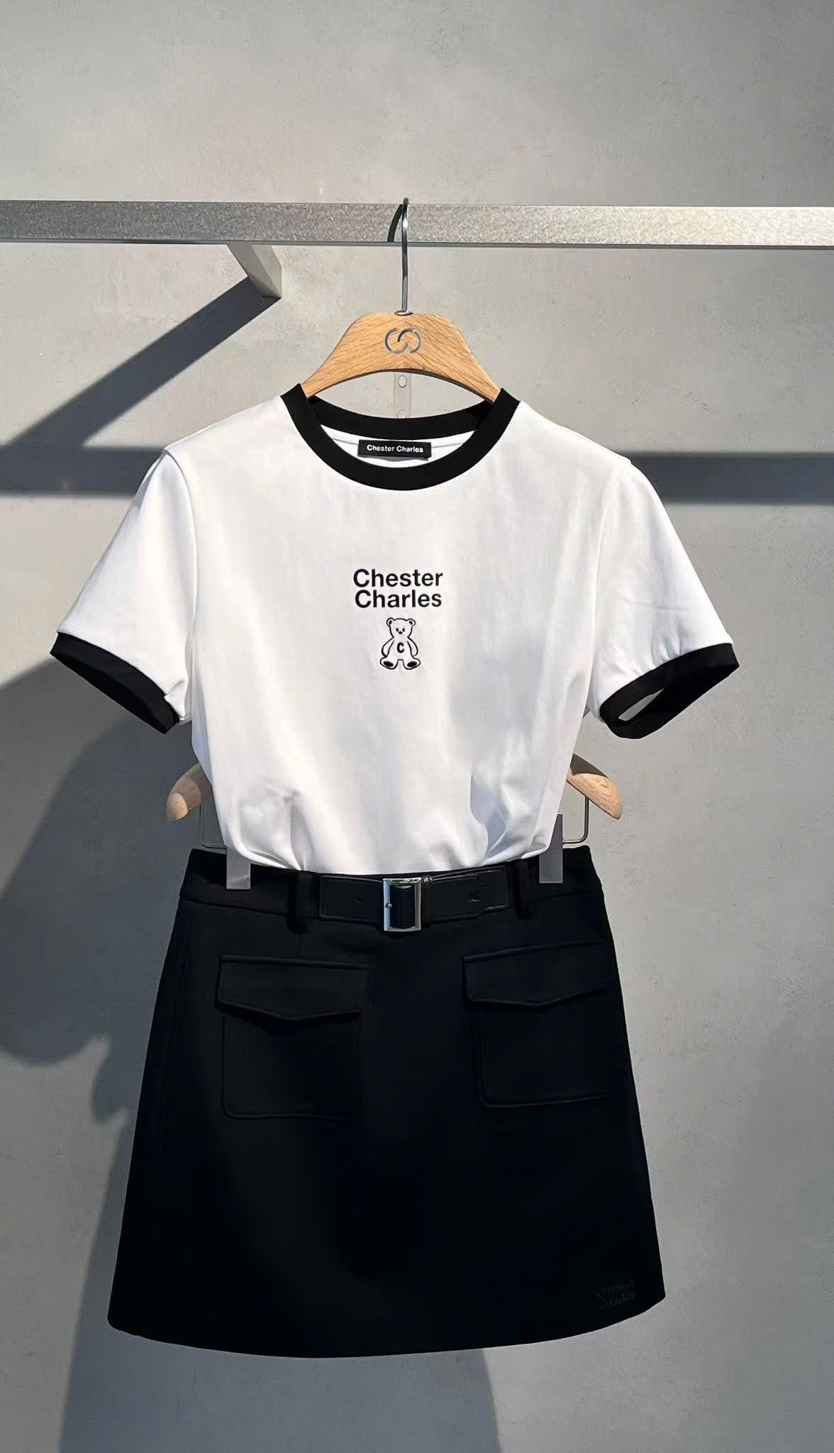  Chân váy chữ A đen, 2 túi trước kèm Belt da 