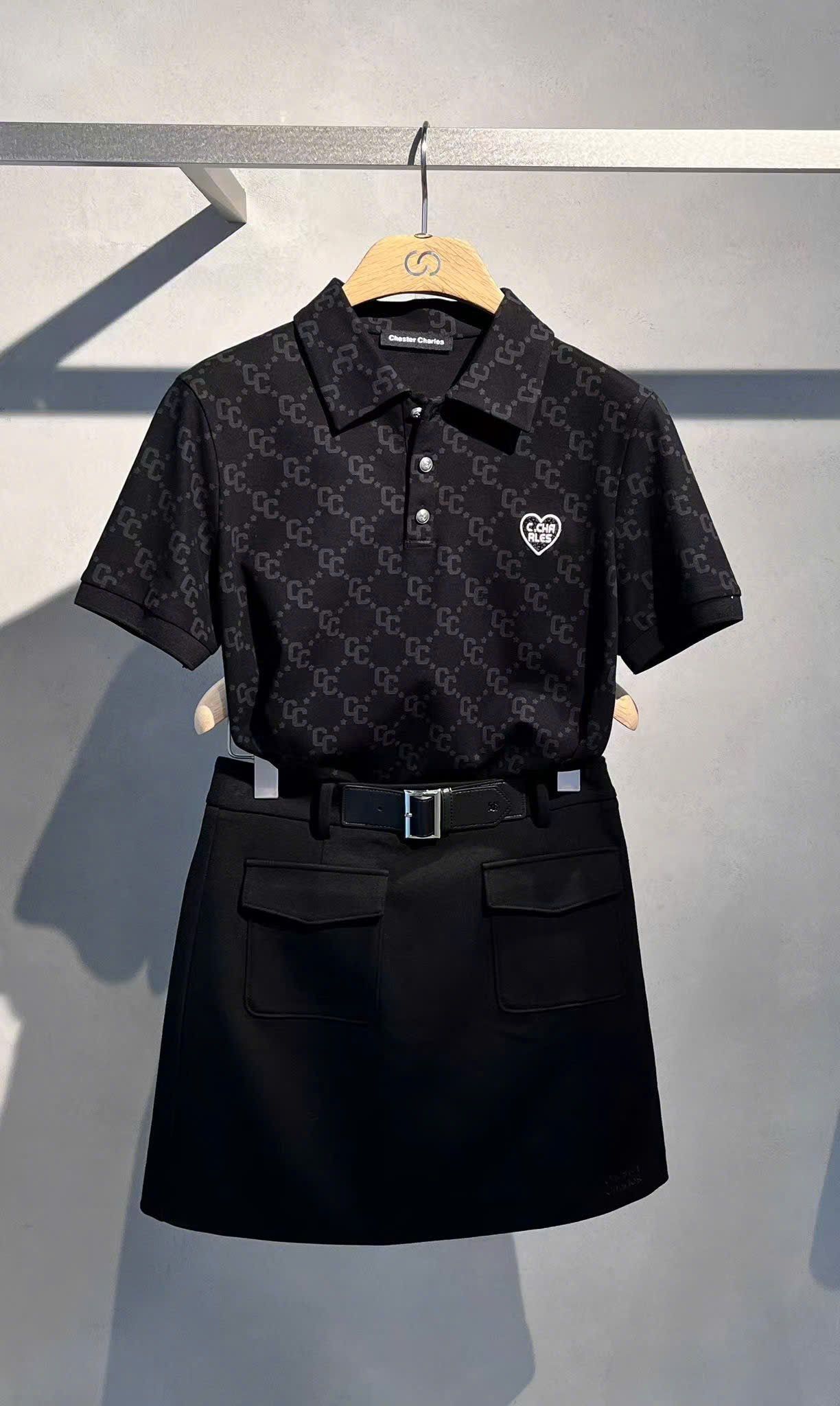  Chân váy chữ A đen, 2 túi trước kèm Belt da 