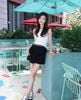  Quần sooc vải đen logo đá nhỏ -cạp chữ CC 