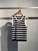  Áo tanktop trắng đen kẻ ngang,logo hồng 