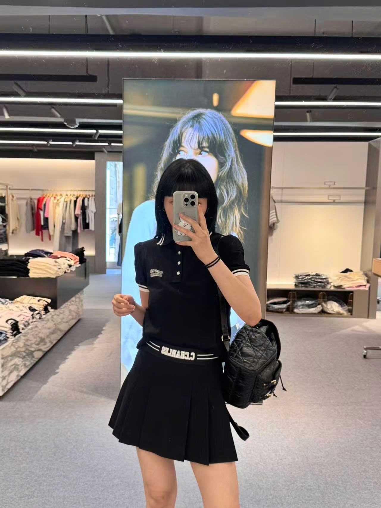  Bộ áo polo cổ viền trắng và chân váy cạp thun C.Charles set 