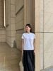  Áo phông trắng - chữ logo đen thêu 