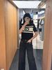  Quần jean đen mài, 2 túi trước xích bạc 